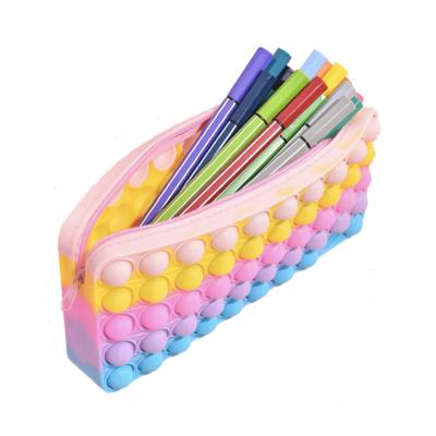 China 2021 new design silicone bag silicone squeeze fidgety person toys pop up pencil case for sale