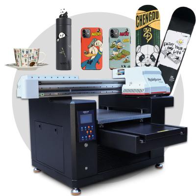 China Newest Metal Rainbow Color A2 Inkjet Printer Size UV ​​Printing Machine For Phone Case With Spot Varnish for sale