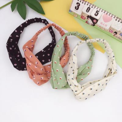 China Popular Elastic Stretch Cross Hair Accessories Custom Knot Workout Headbands For Women for sale