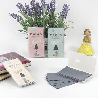 China Hot Selling Eco-friendly Bamboo Cloth Facial Makeup Cleansing Charcoal Oil Blotter With Printed Logo for sale