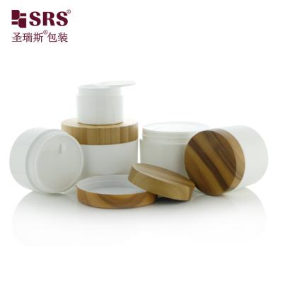 China 50g 100g 150g 200g Glossy PP jars With Water-Transfer printing Bamboo Plastic cap empty containers for body scrub jar for sale