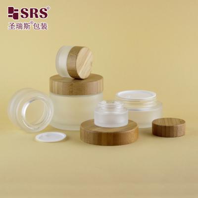 China 15g 30g 50g 100g 200g Empty Clear Matte Custom Glass Cosmetic Jar Bamboo for sale