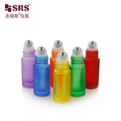 China Luxury Colorful Painted Matte Finished Glass Roller Ball Bottle Perfume Oil Bottles Roll On for sale