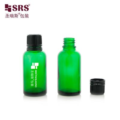 China Empty Cosmetic Massage oils Child Resistant Cap Screw Type With Plug Glass Bottles For Oil for sale