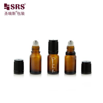 China 10ml Mini Empty Round Amber Glass Bottle With Steel Ball Child Proof Cap For Essential Oil for sale