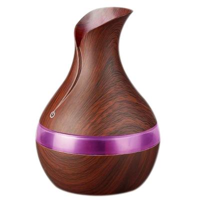 China Hotel Grain USB Humidifier 300ML Mini USB Vase Water Bottle Wooden Essential Oil Diffuser LED Light for sale