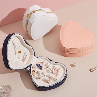 China Custom Leather Jewelry Organizer PU Heart Shape Zipper Waterproof Travel Storage Case Leather Jewelry Box for sale