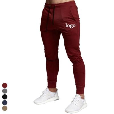 China Customized High Quality Compression Stacked Wweat Antibacterial Pants Outdoor Fitness Men Joggers for sale