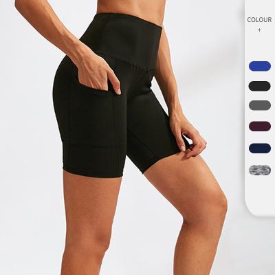 China Wholesale Breathable Women Solid Color High Waist Workout Running Short Compression Gaiters Pants Shorts With Side Pocket for sale