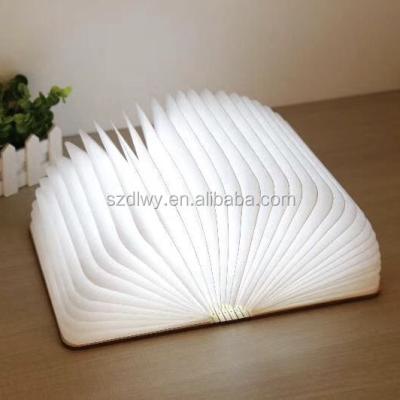 China Dupont Paper Folding Book Lamp LED Mini Lumio Aluminum Waterproof Wooden Book Shaped Table Lamp Led Book Light for sale