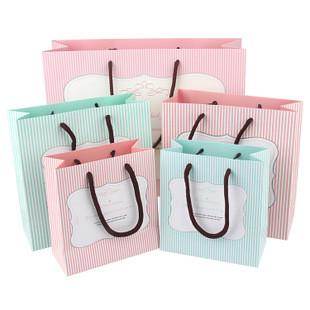 China Customized professional paper gift bags with logo paper gift bags with handles paper gift bags wholesale best quality for sale