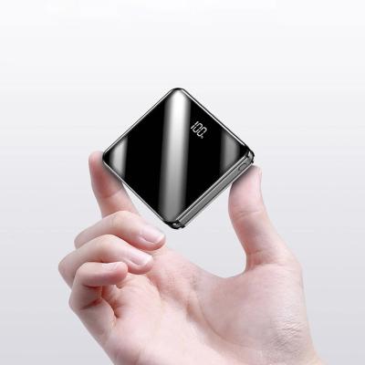 China 2020 Best Selling Unique Trending Portable 10000mAh Technology Number Display Products Sharing Shape Wireless Charging Power Banks for sale