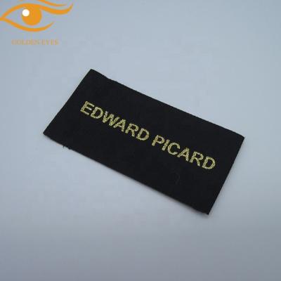 China Viable Luxury Gold Line Woven Brand Label For Garment Neck High Quality Woven Labels for sale