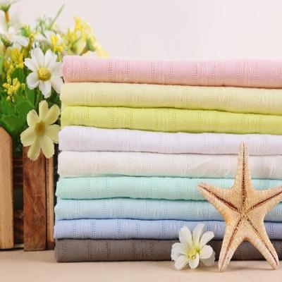 China Double faced wholesale cheap sublimation woven curtain jacquard eyelet dyed pure cotton fabric for T-shirt for sale