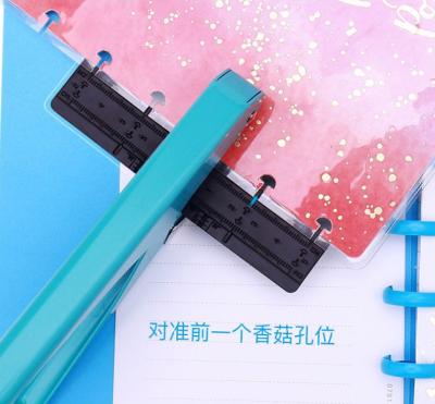 China Plastic Disc Offices Stationery Tools Like Manual Mushroom Hole Form Punch DIY Paper Cutter T Hole Punch for sale