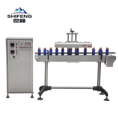 China Automatic Induction Sealer Food Aluminum Foil Bottle Sealing Machine for sale