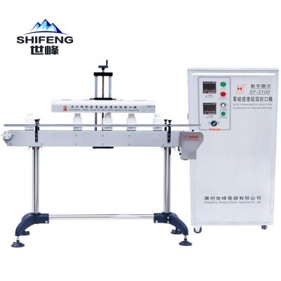 China SF-2300 Automatic Food Induction Sealer Aluminum Foil Bottle Sealing Machine for sale