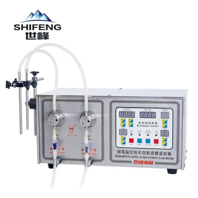 China SF-2-1 Beverage Easy Operate Small Juice Water Bottling Filling Machine for sale