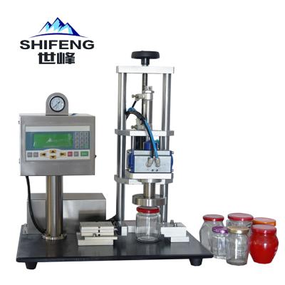 China SFXG-300 Manual Food Table Top Mini Screw Glass Bottles Capping Machine for sale