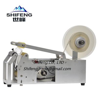 China SFYT-1 Small automatic food cheap price tabletop labeling machine for round bottle for sale