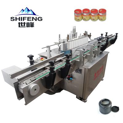 China Hot Rotary Glue Wet Glue Top Flask Food Melt Automatic Round Wine Bottle Labeling Machine for sale