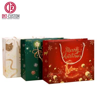 China Recyclable Christmas Gift Bags With Handle Reusable Paper Bag Packaging Gift Bag for sale