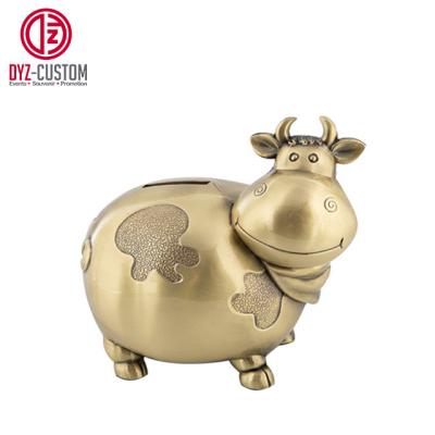 China Cute Souvenir Cash Cow Shaped Piggy Bank Piggy Bank for sale