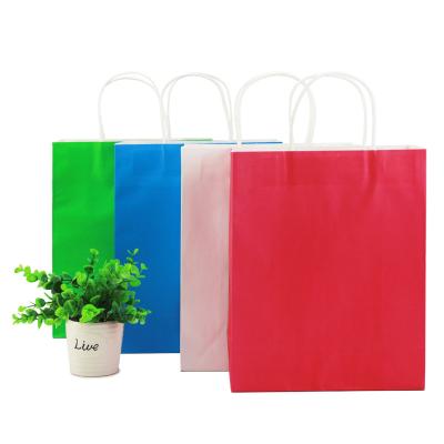 China Recyclable Food Flower Gift Packaging Kraft Paper Bags With Handle White Paper Bag With Printed for sale