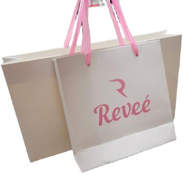 China Recycled Materials China Manufacturer Colorful Luxury Printed Custom Gift Shopping Paper Bag With Your Own Logo for sale