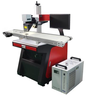 China Water Cooled High Speed ​​UV Laser Marking Machine With CCD Video Positioning System For Phone Marking White Plastic Charger for sale