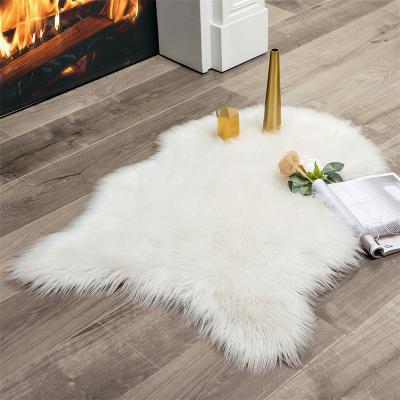 China Luxury Washable Solid Mulan Faux Fur Mat Arc Rug Fur Mat Customize Soft Animal Shape Sofa Floor Mat for sale