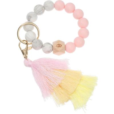 China New Fashionable Women's Creative Wrist Silicone Tassel Macrame Amazon Bracelet Key Chain Cotton Key Chains for sale