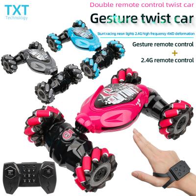 China Drift Stunt Amazon Model New Gesture Remote Control Stunt Air 360 Degree Rotation 4WD Vehicle Remote Control Vehicle Toys for sale