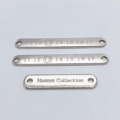 China High Quality Viable Engraved Silver Plated Name Metal Logo For Bag Custom Letter Garment Metal Label for sale