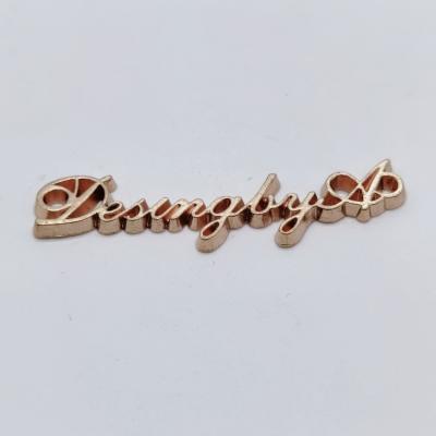 China Viable High Quality Washable Stable Letter Form Logo Gold Plated Metal Label Custom Made For Swimwear for sale