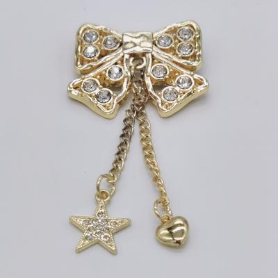 China New Fashion Decoration Women Rhinestone Butterfly Bowtie Brooches Garment Accessories Gold Plated Brooch For Party for sale