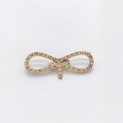 China Full-jeweled decoration gold / small silver plating bow tie garment metal brooch with rhinestone for sale