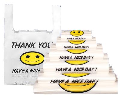 China White high quality BIODEGRADABLE thank you smile face vest plastic shopping bags transparent plastic bag supermarket handle for sale