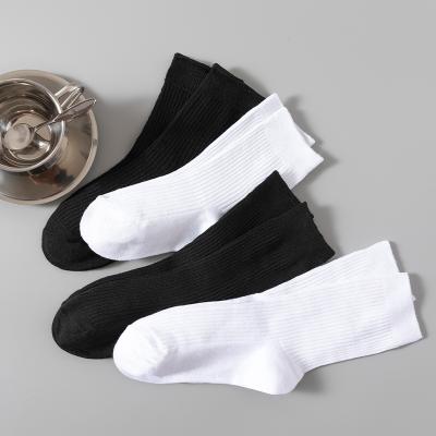 China Sporty accept customization Autumn Trending Solid white and black jacquard embroidery ankle socks custom made women's socks for sale