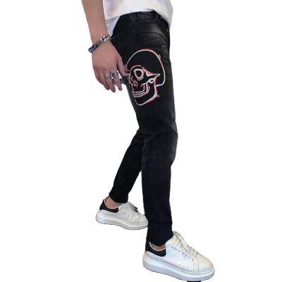 China SKYKINGDOM QUICK DRY mens fashion jeans 2021 skinny mens black jeans ripped slim mens jeans with rhinestones for sale