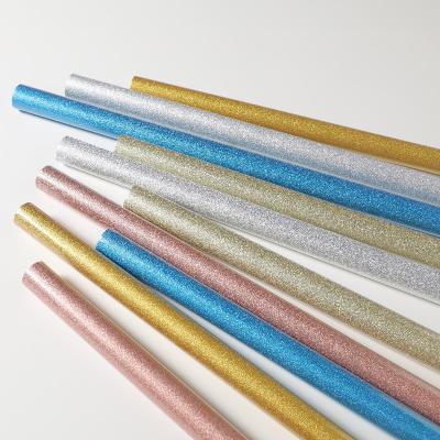 China 60g 70g 80g Glossy Glitter Paper Cheap Luxury Custom Greaseproof Gift Wrapping Paper For Roll for sale