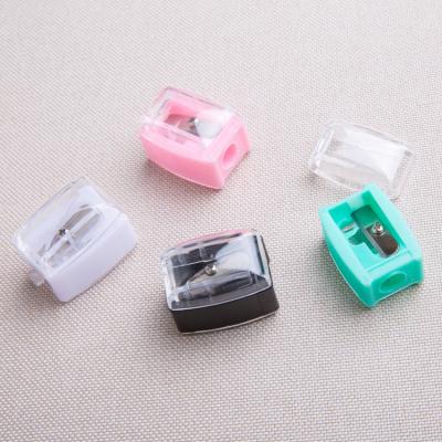 China Single Hole Cosmetic Sharpener Flap Eyebrow Pencil Pink Sharpener for sale