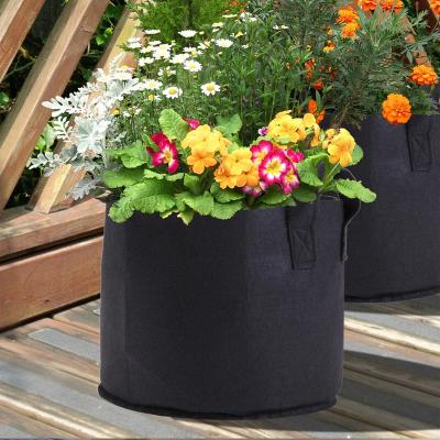 China Garden Waterproof Bags For Vegetable Cloth Planting Pots With Handles Potato Planter Bag With Access Flap for sale