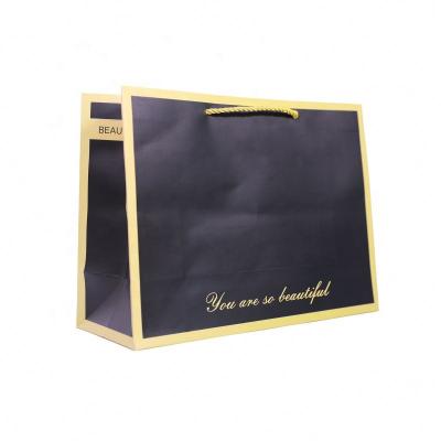 China Cheap Recyclable Paper Logo With Handle Shopping Bag Gift Paper Bag for sale