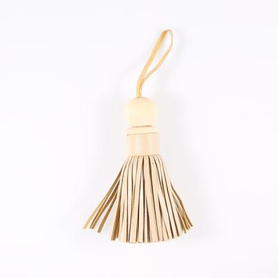 China Fashoion Qunique Wholesale Leather Tassels For Handbags Opens PU Leather Tassel Gifts for sale