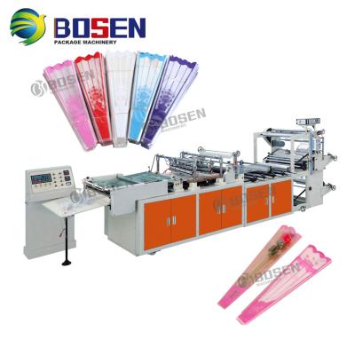 China triangle type flower plastic film bag making machine triangle type flower plastic film bag making machine for sale