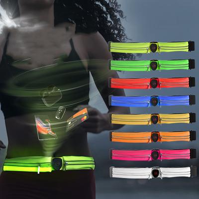 China Universal Waterproof LED USB Rechargeable Double Waist Bag Men Sport Double Pocket Led Running Belt Sports Waist Bag for sale