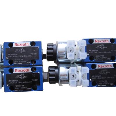 China Iron 4WE10E/J/L/U/G hydraulic type Rexroth dc directional electric stability control solenoid valve 24v with low price for sale