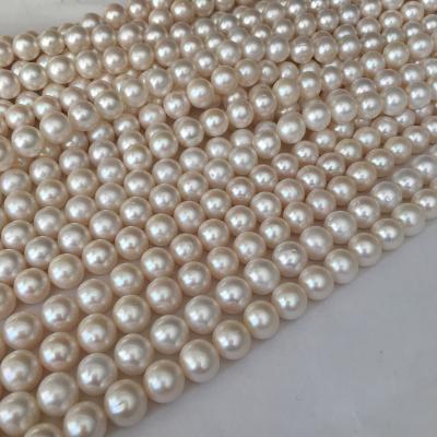 China For jewelry making 100% FRESHWATER PEARL, 10.3-11.3 mm aa good quality perfect round pearl in loose strand wholesale pearl small point flaw for sale