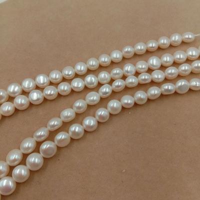 China For jewelry making 39 cm, 7-8 mm AAA baroque loose coin shape freshwater pearl in strand for sale